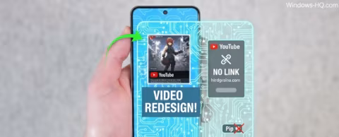 A hand holding a phone displaying a screen with video and link previews.