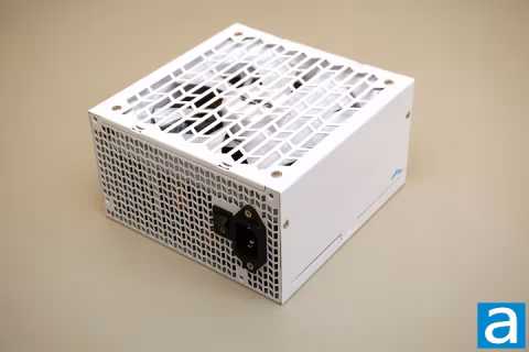 A white computer power supply unit with a mesh front panel, viewed from the front.