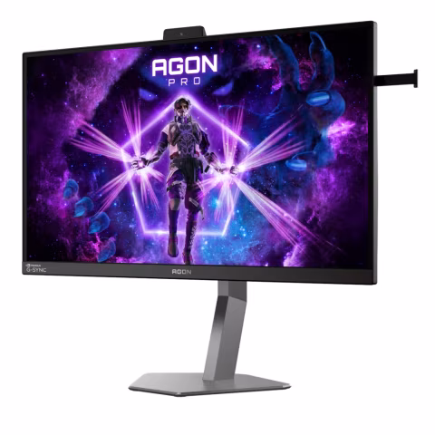 A black computer monitor displaying a character against a vibrant purple, blue, and pink cosmic background.