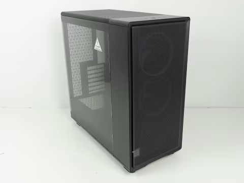 Large, black rectangular computer case with mesh paneling and two circular speaker grilles.