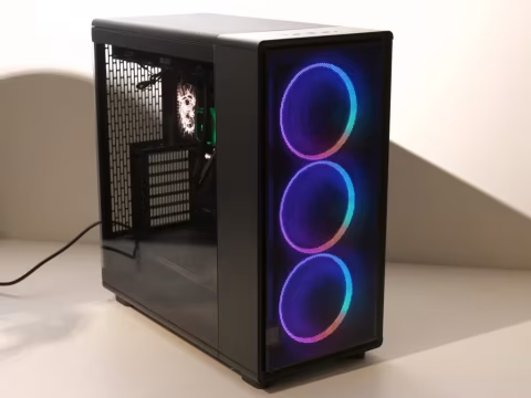 Black computer case with glowing internal components and a glass panel featuring three circular lights.