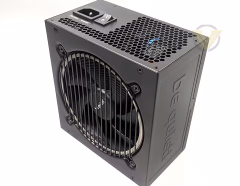 A black power supply unit (PSU) with a visible fan on the front face.