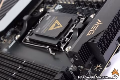 A motherboard with large components, including a central CPU socket area and attached heat sinks.