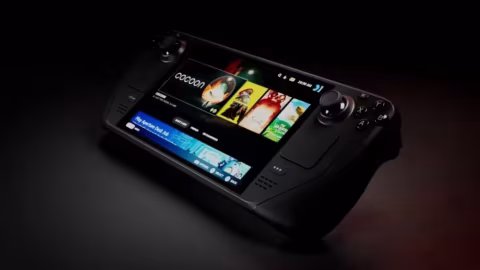 Portable gaming device displaying a home screen with an Android-like interface.