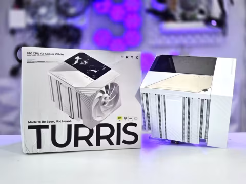 Two white air coolers, labeled TURRIS, are positioned on a surface.