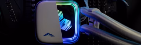 Close-up view of electronic components and a blue-rimmed peripheral device.