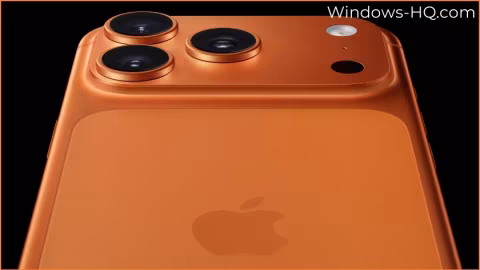 A side view of a smartphone displaying a gold-colored back with a triple camera module.