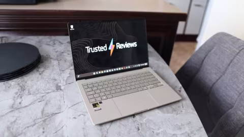 Open Asus laptop displaying a website titled 'Trusted Reviews'.