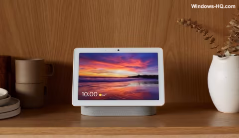 Apple tablet displaying a sunrise scene with digital clock and weather information.