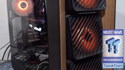 Close-up of computer hardware featuring multiple fan panels and metal chassis components.